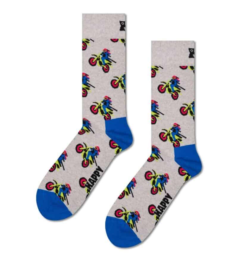 Brightly colored motorcycle pattern socks with blue toe and heel accents.